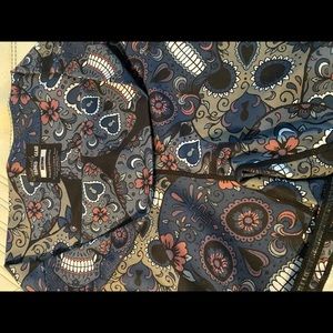 Midnight skulls, 5 inch inseam with silicone band intact.